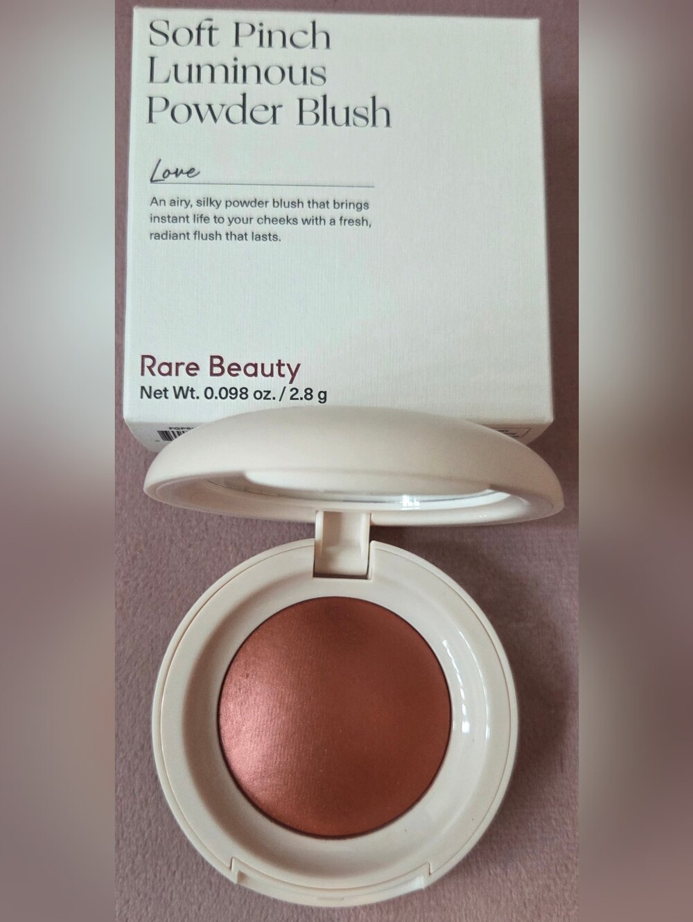 Rare Beauty blush in warm copper-rose